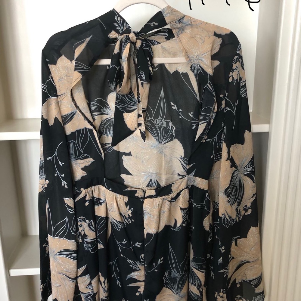 Floral romper with open back